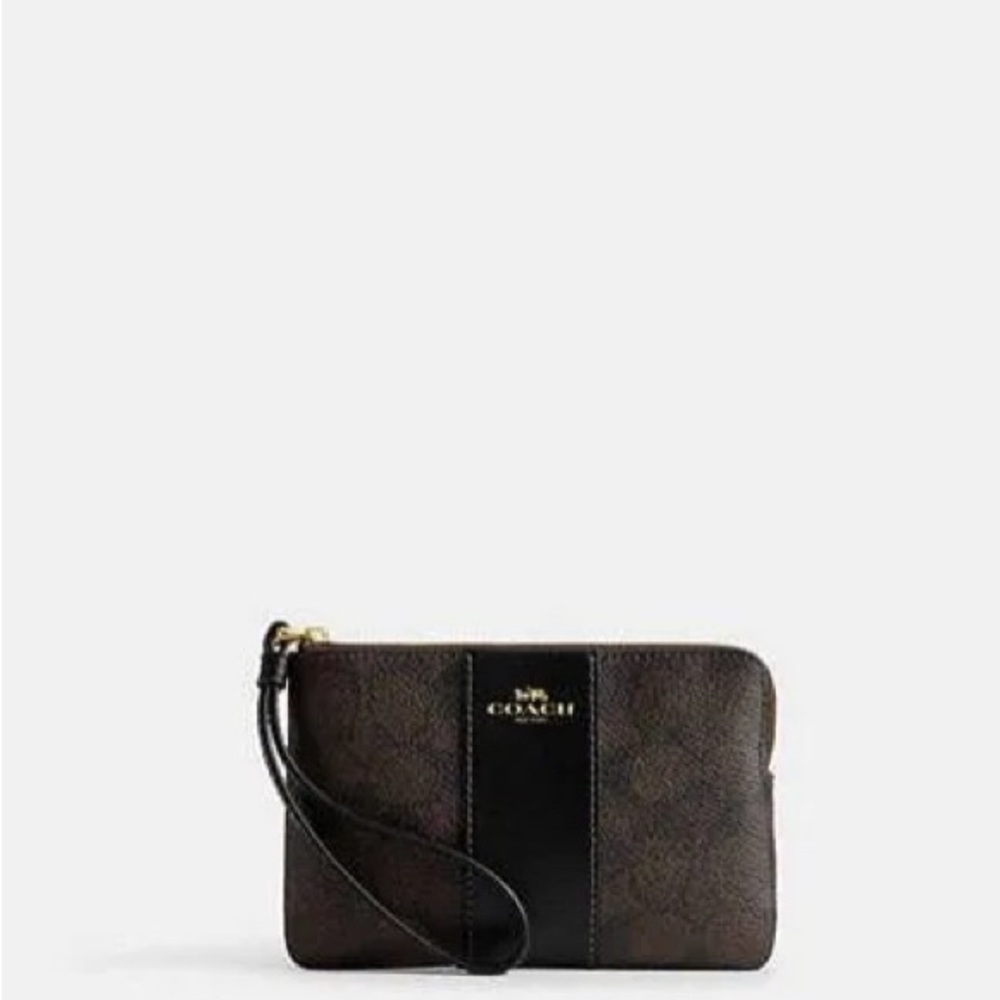 Signature Coach Black and gold wristlet New!